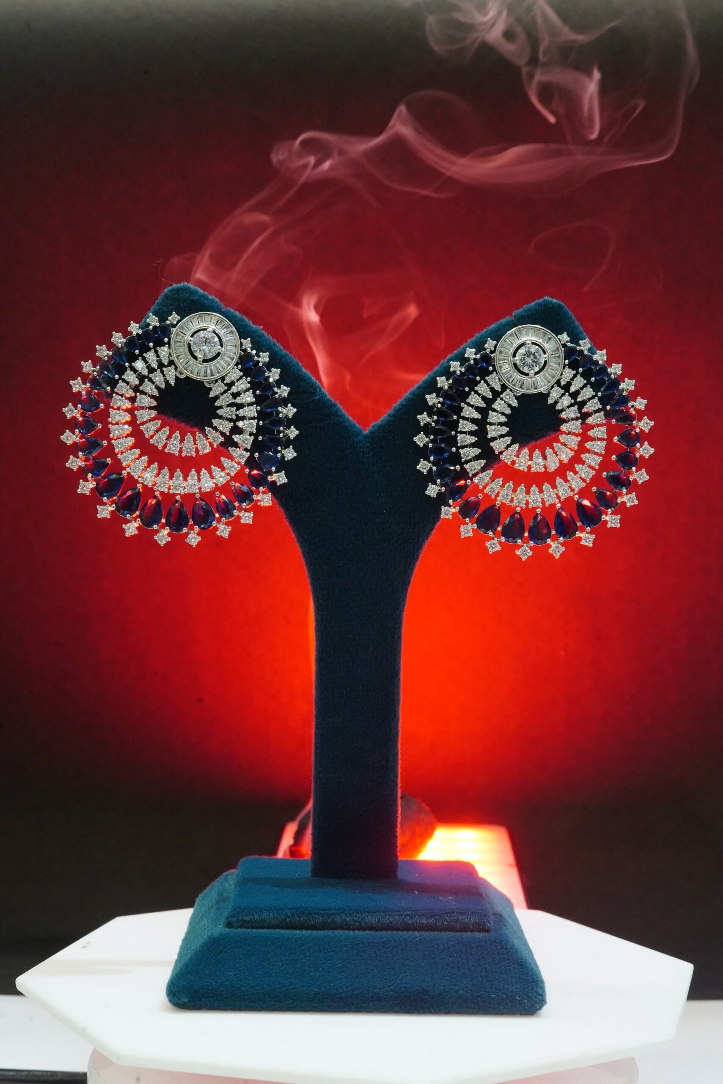 Circular earrings with stone detailing