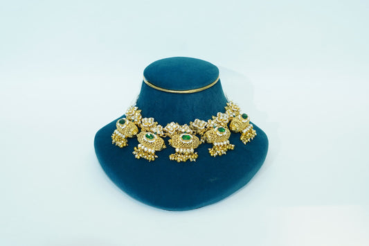 Gold plated green stone studded choker
