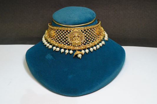 Embellished gold toned necklace