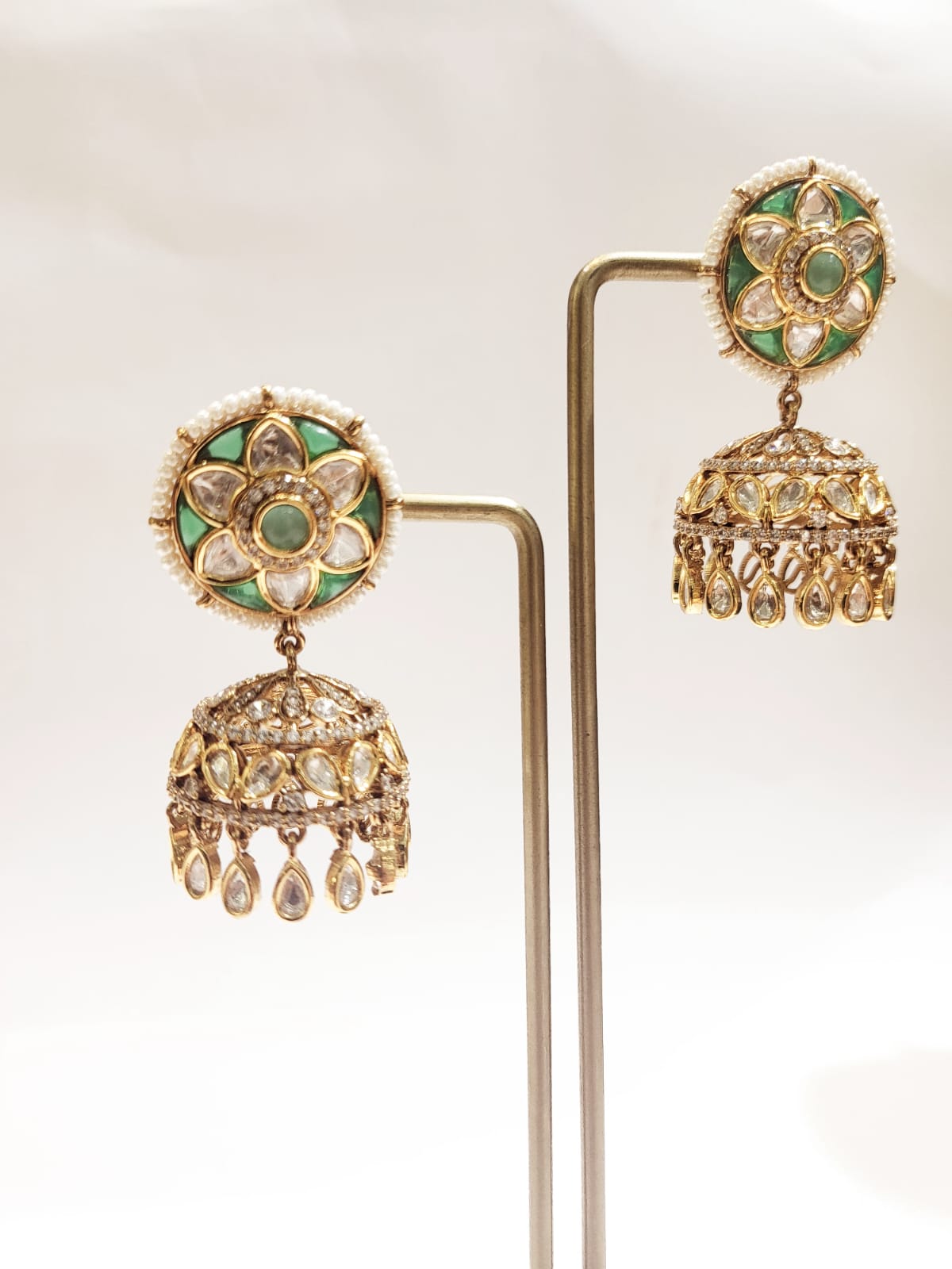 Royal Emerald Kundan Jhumka Earrings with Pearl Detailing & Floral Stud