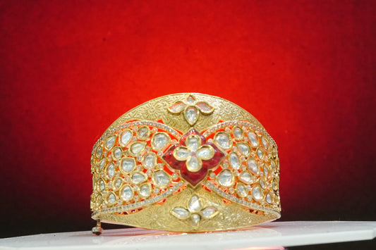 Flower detail gold plated bangle