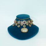 Flower cut detailing, prominent stone choker