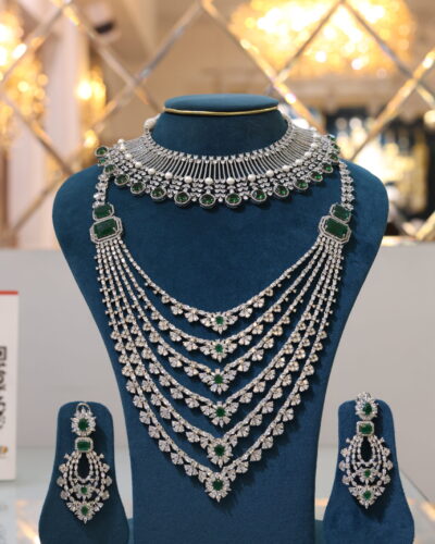 Green silver stone studded jewellery set