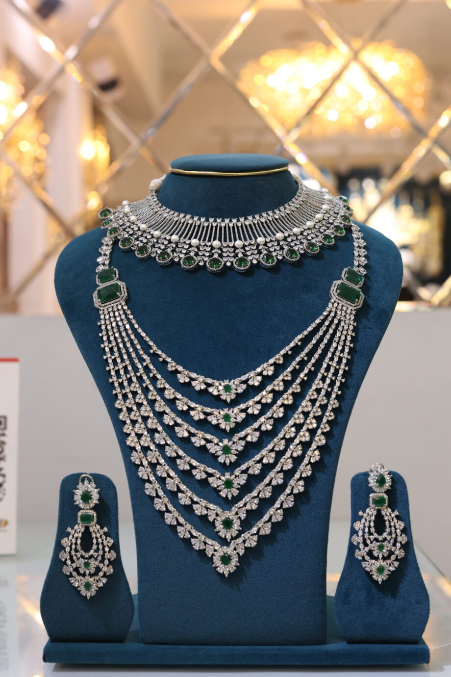 Green silver stone studded jewellery set